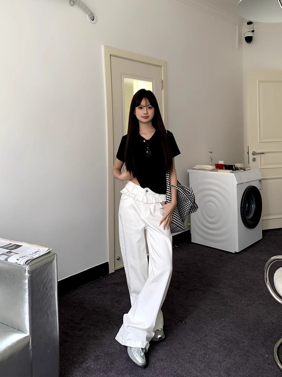 Elegante jeans met wijde pijpen en kanten randjes