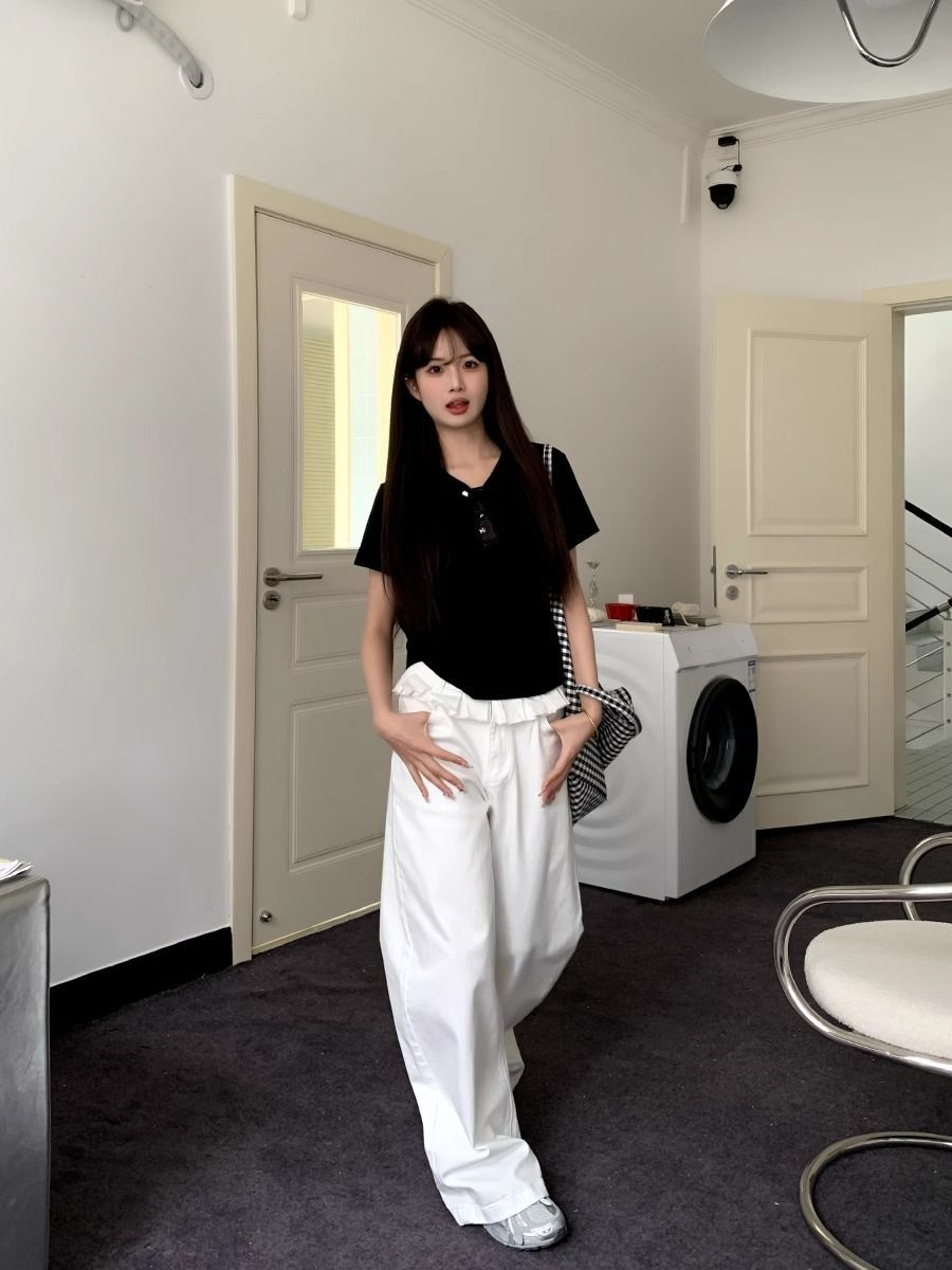 Elegante jeans met wijde pijpen en kanten randjes